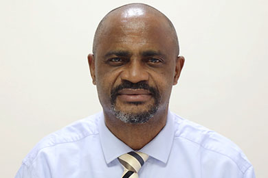 Dr. Andrew Okolie
