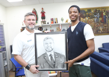 Freshman presents art pieces to President Frazier and VP Byron 