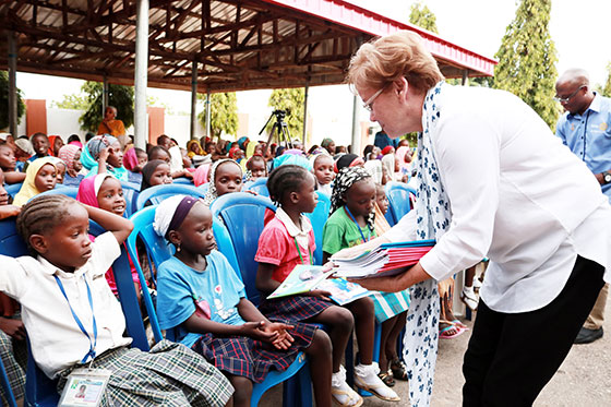 President Ensign sharing gifts among the girls