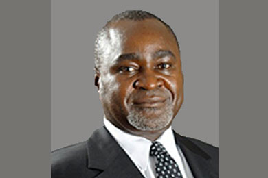 H.E. Dr Gilbert Bukenya