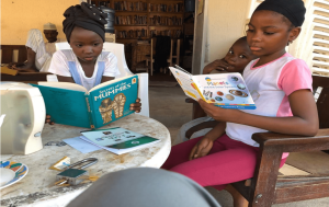 Children reading at the library